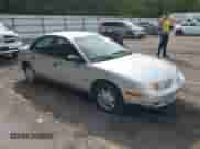 2002 Saturn SL z VIN 1G8ZG54822Z289987, wystawiony jako IAAI lot #43113365 z przebiegiem 233 738 mil mil oraz . Historia ofert i sprzedaży dostępna na DreamBid. Obrazek 1.