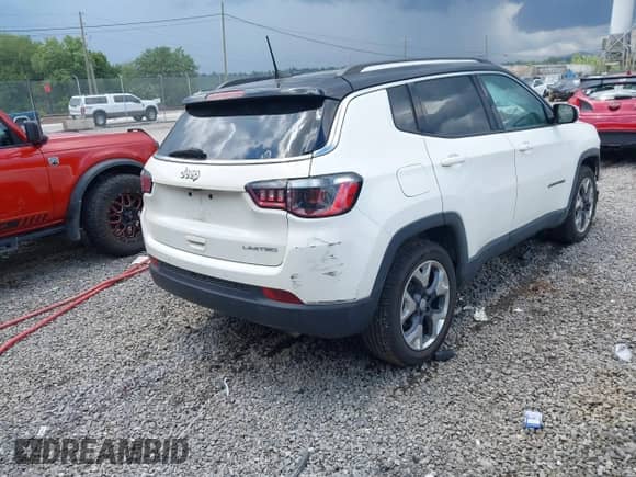 2018 Jeep Compass Limited with VIN 3C4NJCCB1JT188498, listed as a IAAI auction lot 42717751 with 84,227 mi miles and . Bid and sale history available at DreamBid. Image 4.