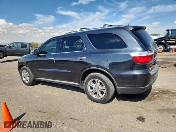2013 Dodge Durango Crew with VIN 1C4RDJDG7DC666625, listed as a Copart auction lot 86482635 with 115,047 mi miles and Salvage title. Bid and sale history available at DreamBid. Image 2.