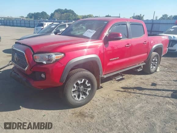 2019 Toyota Tacoma SR5 with VIN 3TMAZ5CNXKM102209, listed as a IAAI auction lot 43392417 with 94,767 mi miles and . Bid and sale history available at DreamBid. Image 2.