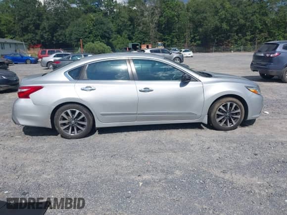 2016 Nissan Altima S z VIN 1N4AL3AP0GC154005, wystawiony jako IAAI lot #42982122 z przebiegiem 151 611 mil mil oraz . Historia ofert i sprzedaży dostępna na DreamBid. Obrazek 12.