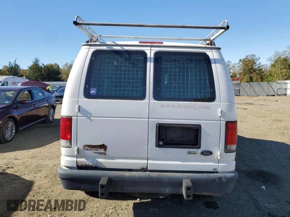 2013 Ford Econoline Cargo Commercial with VIN 1FTNE2EW2DDB22647, listed as a Copart auction lot 87264995 with 190,620 mi miles and Clean title. Bid and sale history available at DreamBid. Image 6.