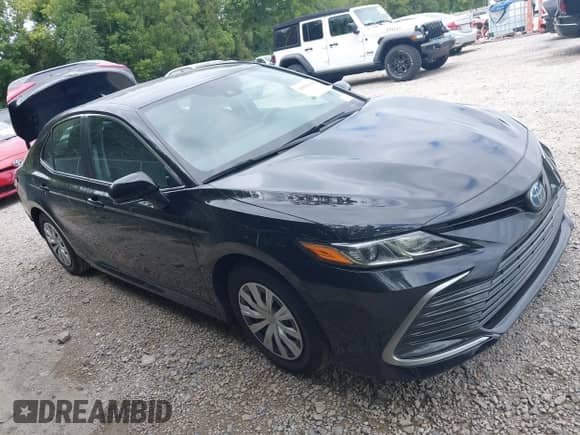 2022 Toyota Camry Hybrid LE with VIN 4T1C31AK3NU574937, listed as a IAAI auction lot 43038140 with 50,708 mi miles and . Bid and sale history available at DreamBid. Image 1.