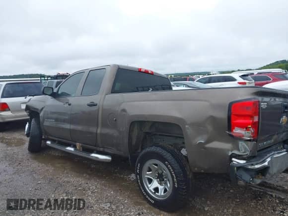 2014 Chevrolet Silverado 1500 Work Truck z VIN 1GCRCPEH7EZ380639, wystawiony jako IAAI lot #43088985 z przebiegiem Nie podano mil oraz . Historia ofert i sprzedaży dostępna na DreamBid. Obrazek 14.