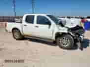 2014 Nissan Frontier S with VIN 1N6AD0EV4EN739182, listed as a Copart auction lot 81960515 with Not provided miles and Salvage title. Bid and sale history available at DreamBid. Image 4.