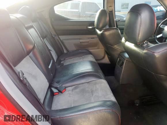 2007 Dodge Charger SRT-8 с VIN 2B3LA73W37H669857, выставлен на аукционе Copart как лот 57144425 с пробегом 169 933 миль миль и Чистый • Clean title. История ставок и продаж доступна на DreamBid. Изображение 10.