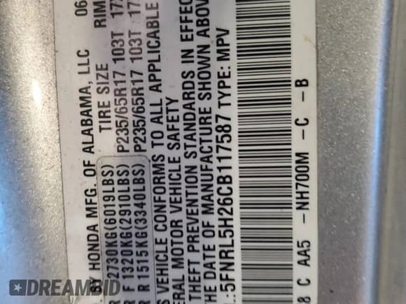 2012 Honda Odyssey LX z VIN 5FNRL5H26CB117587, wystawiony jako Copart lot #71431495 z przebiegiem 183 045 mil mil oraz Czysty tytuł • Clean title. Historia ofert i sprzedaży dostępna na DreamBid. Obrazek 13.