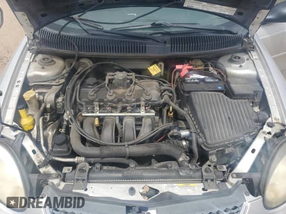 2005 Dodge Neon SXT with VIN 1B3ES56C15D252601, listed as a Copart auction lot 67014285 with 184,476 mi miles and Salvage title. Bid and sale history available at DreamBid. Image 11.