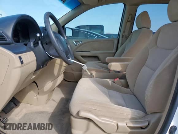 2006 Honda Odyssey LX с VIN 5FNRL38296B113994, выставлен на аукционе Copart как лот 71152875 с пробегом 130 530 миль миль и Списание • Salvage title. История ставок и продаж доступна на DreamBid. Изображение 7.