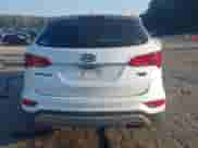 2017 Hyundai Santa Fe 2.4L with VIN 5NMZUDLBXHH032305, listed as a IAAI auction lot 43267307 with 139,069 mi miles and . Bid and sale history available at DreamBid. Image 16.