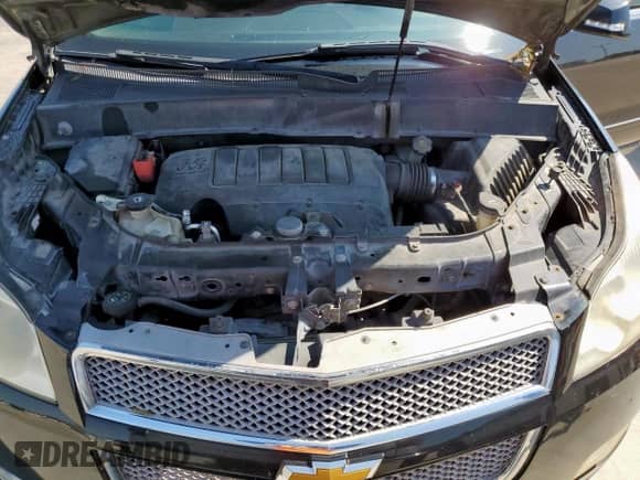 2012 Chevrolet Traverse LTZ with VIN 1GNKRLED2CJ340087, listed as a Copart auction lot 72054655 with 187,443 mi miles and Salvage title. Bid and sale history available at DreamBid. Image 12.
