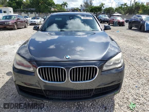 2015 BMW 7 Series 740i с VIN WBAYA6C50FGK16244, выставлен на аукционе Copart как лот 84005165 с пробегом 137 489 миль миль и Списание • Salvage title. История ставок и продаж доступна на DreamBid. Изображение 5.