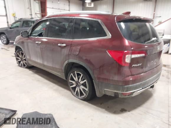 2021 Honda Pilot Touring 7-Passenger z VIN 5FNYF6H61MB044707, wystawiony jako IAAI lot #41548250 z przebiegiem 77 147 mil mil oraz . Historia ofert i sprzedaży dostępna na DreamBid. Obrazek 3.