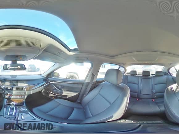 2011 BMW 5 Series 535i xDrive with VIN WBAFU7C55BC873031, listed as a Copart auction lot 82002815 with 119,837 mi miles and Salvage title. Bid and sale history available at DreamBid. Image 14.