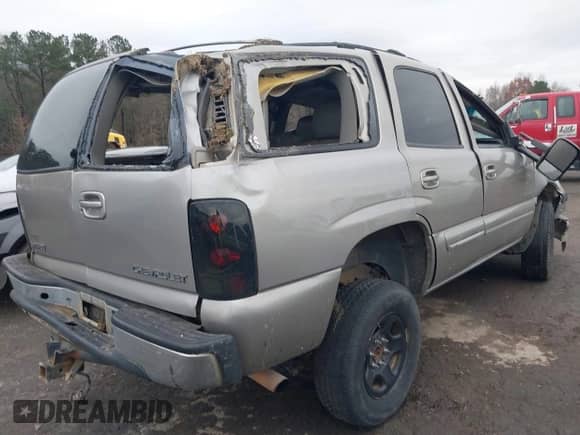 2000 Chevrolet Tahoe LT with VIN 1GNEK13TXYJ173159, listed as a IAAI auction lot 41019840 with Not provided miles and . Bid and sale history available at DreamBid. Image 4.