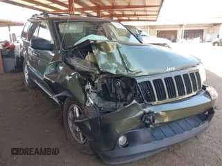 2009 Jeep Grand Cherokee Laredo with VIN 1J8HR48P49C517517, listed as a IAAI auction lot 42945916 with 127,004 mi miles and . Bid and sale history available at DreamBid. Image 1.