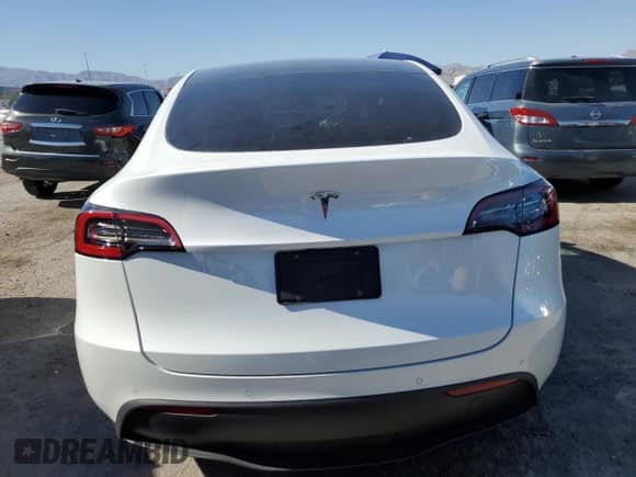 2021 Tesla Model Y Performance with VIN 5YJYGAED6MF181502, listed as a Copart auction lot 58582634 with 33,772 mi miles and Salvage title. Bid and sale history available at DreamBid. Image 6.