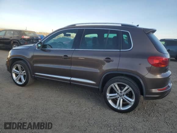 2015 Volkswagen Tiguan Comfortline with VIN WVGJV7AX9FW048706, listed as a Copart auction lot 89731605 with 232,821 mi miles and Clean title. Bid and sale history available at DreamBid. Image 2.