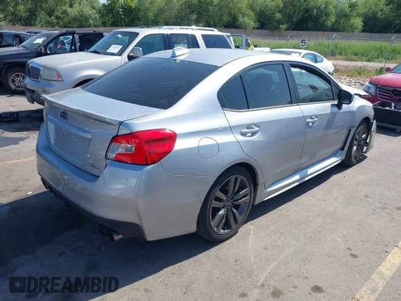 2017 Subaru WRX Premium z VIN JF1VA1E68H8834994, wystawiony jako IAAI lot #42418866 z przebiegiem 103 507 mil mil oraz . Historia ofert i sprzedaży dostępna na DreamBid. Obrazek 4.