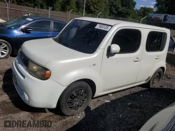 2010 Nissan Cube SL с VIN JN8AZ2KR8AT168118, выставлен на аукционе Copart как лот 71653125 с пробегом 195 388 миль миль и Списание • Salvage title. История ставок и продаж доступна на DreamBid. Изображение 1.
