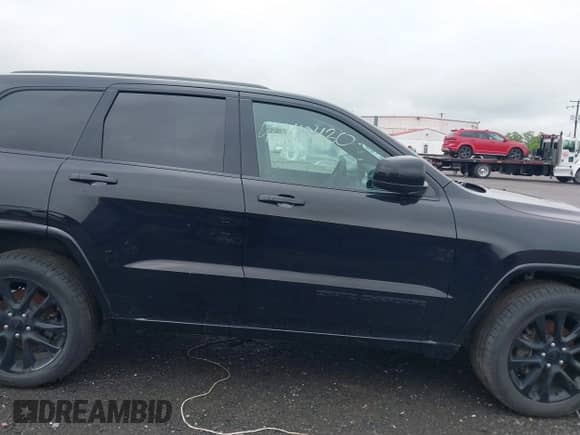 2019 Jeep Grand Cherokee Altitude with VIN 1C4RJFAG9KC579011, listed as a IAAI auction lot 42263250 with 85,595 mi miles and . Bid and sale history available at DreamBid. Image 13.