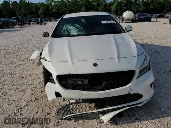 2018 Mercedes-Benz CLA 250 с VIN WDDSJ4EB0JN616329, выставлен на аукционе Copart как лот 71370525 с пробегом 99 270 миль миль и Списание • Salvage title. История ставок и продаж доступна на DreamBid. Изображение 13.