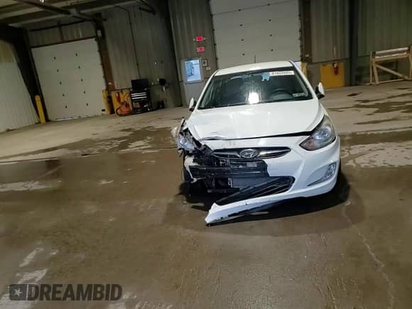 2012 Hyundai Accent SE z VIN KMHCU5AE6CU054999, wystawiony jako Copart lot #81822645 z przebiegiem 95 131 mil mil oraz Szkoda całkowita • Salvage title. Historia ofert i sprzedaży dostępna na DreamBid. Obrazek 13.