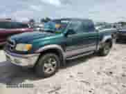 2001 Toyota Tundra Limited z VIN 5TBBT48101S167986, wystawiony jako Copart lot #64989255 z przebiegiem 217 919 mil mil oraz Czysty tytuł • Clean title. Historia ofert i sprzedaży dostępna na DreamBid. Obrazek 1.