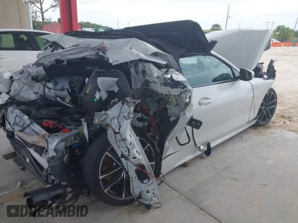 2022 BMW 4 Series 430i с VIN WBA23AT02NCK17876, выставлен на аукционе IAAI как лот 43088630 с пробегом Не указан миль и . История ставок и продаж доступна на DreamBid. Изображение 4.