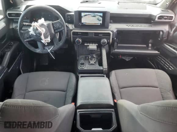 2024 Toyota Tacoma SR с VIN 3TYKD5HNXRT015274, выставлен на аукционе Copart как лот 89548525 с пробегом 16 536 миль миль и Списание • Salvage title. История ставок и продаж доступна на DreamBid. Изображение 8.