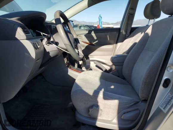 2003 Toyota Corolla LE с VIN JTDBR32E030031634, выставлен на аукционе Copart как лот 81804335 с пробегом 193 865 миль миль и Списание • Salvage title. История ставок и продаж доступна на DreamBid. Изображение 7.