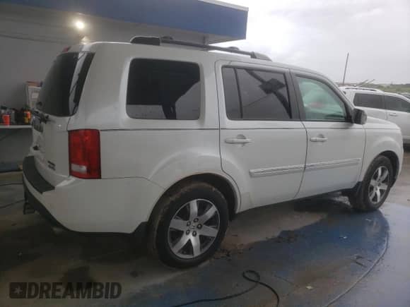 2014 Honda Pilot Touring z VIN 5FNYF4H94EB051537, wystawiony jako Copart lot #86239175 z przebiegiem 128 827 mil mil oraz Czysty tytuł • Clean title. Historia ofert i sprzedaży dostępna na DreamBid. Obrazek 3.