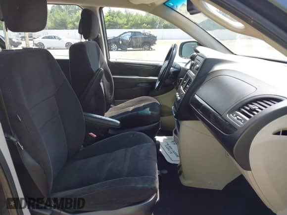 2014 Dodge Grand Caravan SE with VIN 2C4RDGBG7ER248080, listed as a IAAI auction lot 42683662 with 128,616 mi miles and . Bid and sale history available at DreamBid. Image 5.