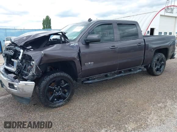 2014 Chevrolet Silverado 1500 LT with VIN 3GCUKREH4EG545779, listed as a IAAI auction lot 42189784 with 129,037 mi miles and . Bid and sale history available at DreamBid. Image 18.