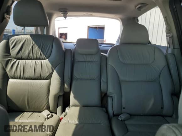 2007 Honda Odyssey EX-L z VIN 5FNRL38637B043607, wystawiony jako Copart lot #70324515 z przebiegiem 193 337 mil mil oraz Szkoda całkowita • Salvage title. Historia ofert i sprzedaży dostępna na DreamBid. Obrazek 10.