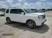 2014 Honda Pilot EX-L with VIN 5FNYF3H5XEB013849, listed as a Copart auction lot 69325505 with 111,728 mi miles and Non repairable. Bid and sale history available at DreamBid. Image 11.