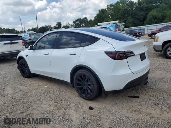 2023 Tesla Model Y Long Range with VIN 7SAYGDEE5PF690904, listed as a Copart auction lot 67058755 with 27,914 mi miles and Salvage title. Bid and sale history available at DreamBid. Image 2.