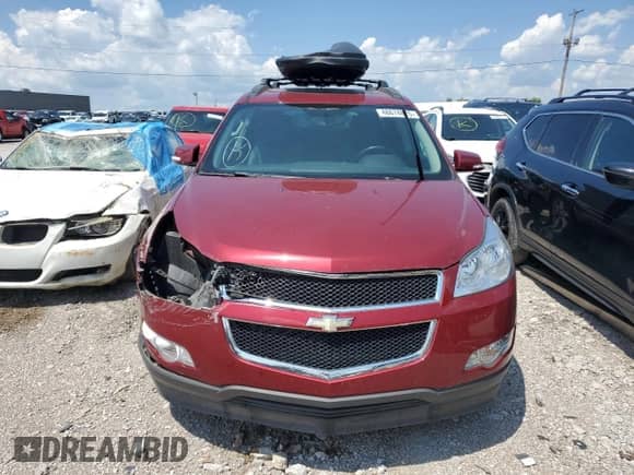 2011 Chevrolet Traverse 2LT z VIN 1GNKRJED1BJ187947, wystawiony jako Copart lot #48674825 z przebiegiem Nie podano mil oraz Szkoda całkowita • Salvage title. Historia ofert i sprzedaży dostępna na DreamBid. Obrazek 5.