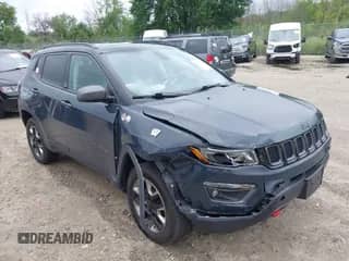 2018 Jeep Compass Trailhawk z VIN 3C4NJDDBXJT144522, wystawiony jako IAAI lot #42759922 z przebiegiem 148 548 mil mil oraz . Historia ofert i sprzedaży dostępna na DreamBid. Obrazek 1.
