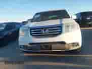 2013 Honda Pilot EX-L with VIN 5FNYF3H57DB004024, listed as a IAAI auction lot 43597652 with 144,099 mi miles and . Bid and sale history available at DreamBid. Image 12.