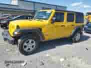 2021 Jeep Wrangler Unlimited Sport with VIN 1C4HJXKN4MW606809, listed as a Copart auction lot 56288484 with 59,561 mi miles and Salvage title. Bid and sale history available at DreamBid. Image 4.