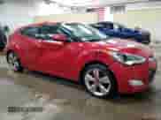 2012 Hyundai Veloster w/Black Int z VIN KMHTC6AD3CU049324, wystawiony jako Copart lot #85596195 z przebiegiem 171 178 mil mil oraz Szkoda całkowita • Salvage title. Historia ofert i sprzedaży dostępna na DreamBid. Obrazek 4.