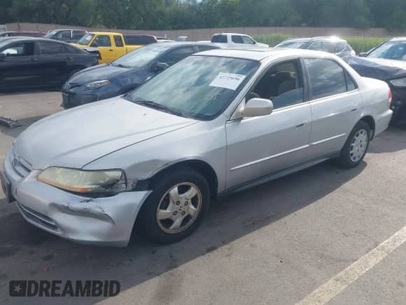 2001 Honda Accord LX with VIN 1HGCG56431A084831, listed as a IAAI auction lot 42725656 with 214,356 mi miles and . Bid and sale history available at DreamBid. Image 17.