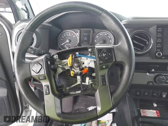 2021 Toyota Tacoma SR5 with VIN 5TFAZ5CN4MX111100, listed as a IAAI auction lot 42570230 with 54,460 mi miles and . Bid and sale history available at DreamBid. Image 6.
