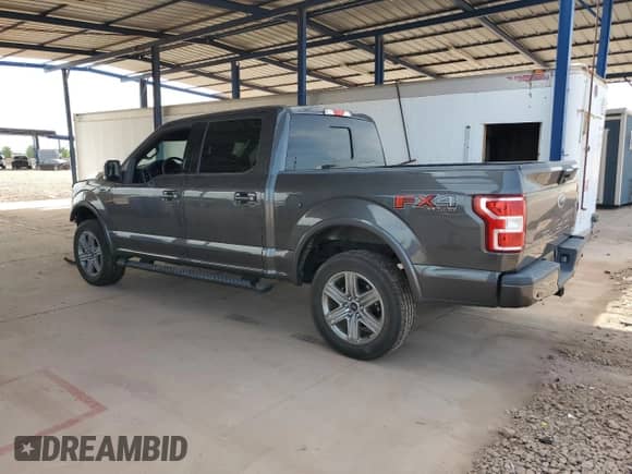 2018 Ford F-150 XLT z VIN 1FTEW1EG1JKE39990, wystawiony jako Copart lot #81076395 z przebiegiem 23 988 mil mil oraz Szkoda całkowita • Salvage title. Historia ofert i sprzedaży dostępna na DreamBid. Obrazek 2.
