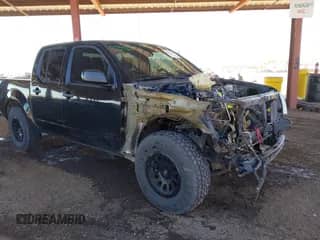 2014 Nissan Frontier SV with VIN 1N6AD0ER4EN743946, listed as a IAAI auction lot 43377552 with 147,597 mi miles and . Bid and sale history available at DreamBid. Image 1.