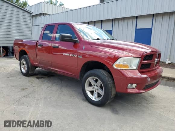 2012 Ram 1500 Express z VIN 1C6RD7FT0CS204609, wystawiony jako Copart lot #71011685 z przebiegiem 198 894 mil mil oraz Czysty tytuł • Clean title. Historia ofert i sprzedaży dostępna na DreamBid. Obrazek 4.