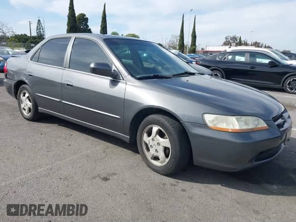 2000 Honda Accord EX with VIN JHMCG6685YC014106, listed as a IAAI auction lot 41753951 with 157,599 mi miles and . Bid and sale history available at DreamBid. Image 1.