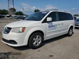 2013 Dodge Grand Caravan SXT with VIN 2C4RDGCG2DR582076, listed as a Copart auction lot 83780575 with 153,959 mi miles and Non repairable. Bid and sale history available at DreamBid. Image 1.