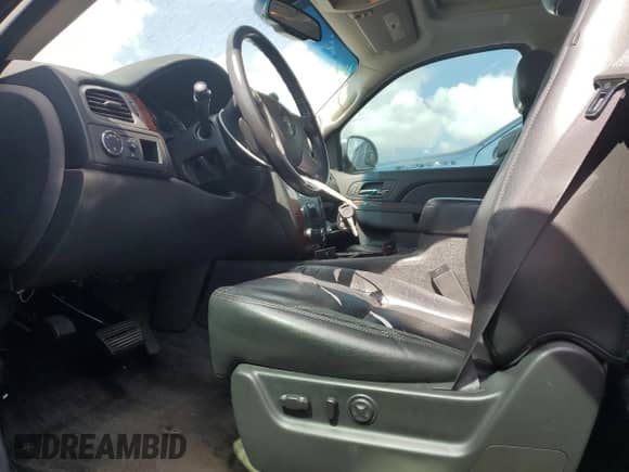 2014 Chevrolet Suburban LTZ with VIN 1GNSCKE07ER166045, listed as a Copart auction lot 68758805 with 162,174 mi miles and Salvage title. Bid and sale history available at DreamBid. Image 7.